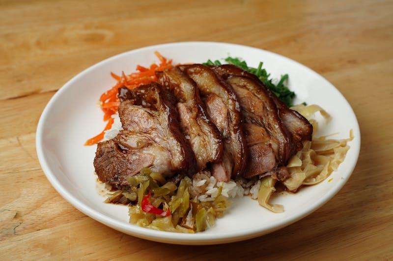 Costa Vida rice bowl with sweet pork and toppings